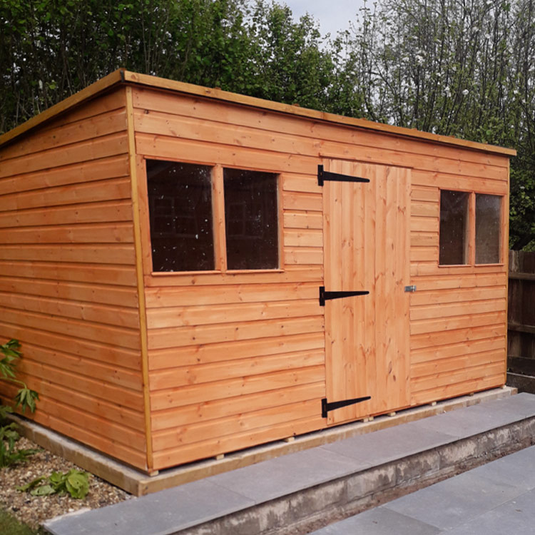 Pent shed with four windows