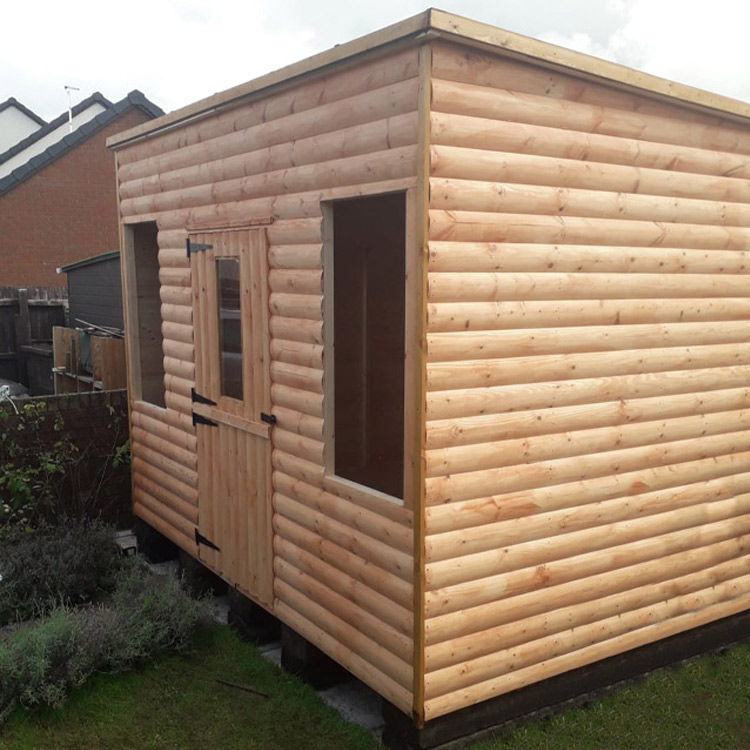 Pent shed made of loglap boards